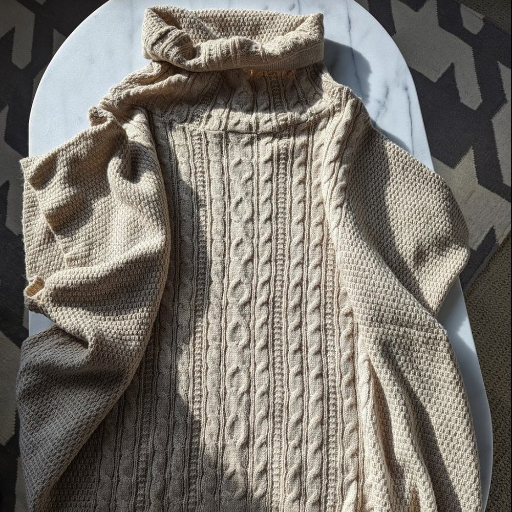 Johnston & Murphy cable knit poncho.